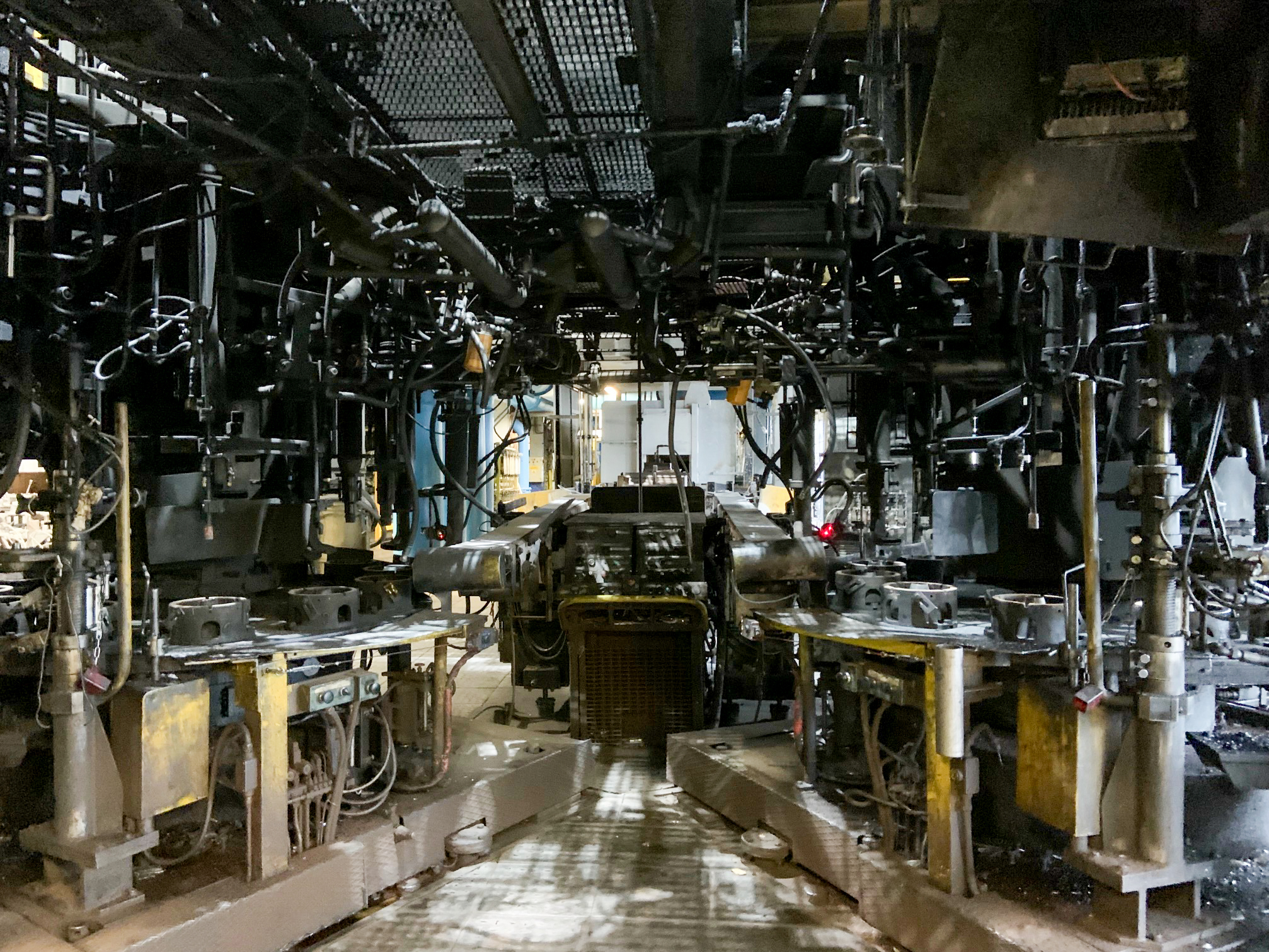 caption: The empty assembly line at the Duralex glassware factory in Orléans, France, on Nov. 15.