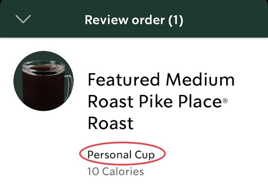 caption: A screenshot from the Starbucks app shows the "personal cup" option selected on a mobile app order on Jan. 4, 2024.