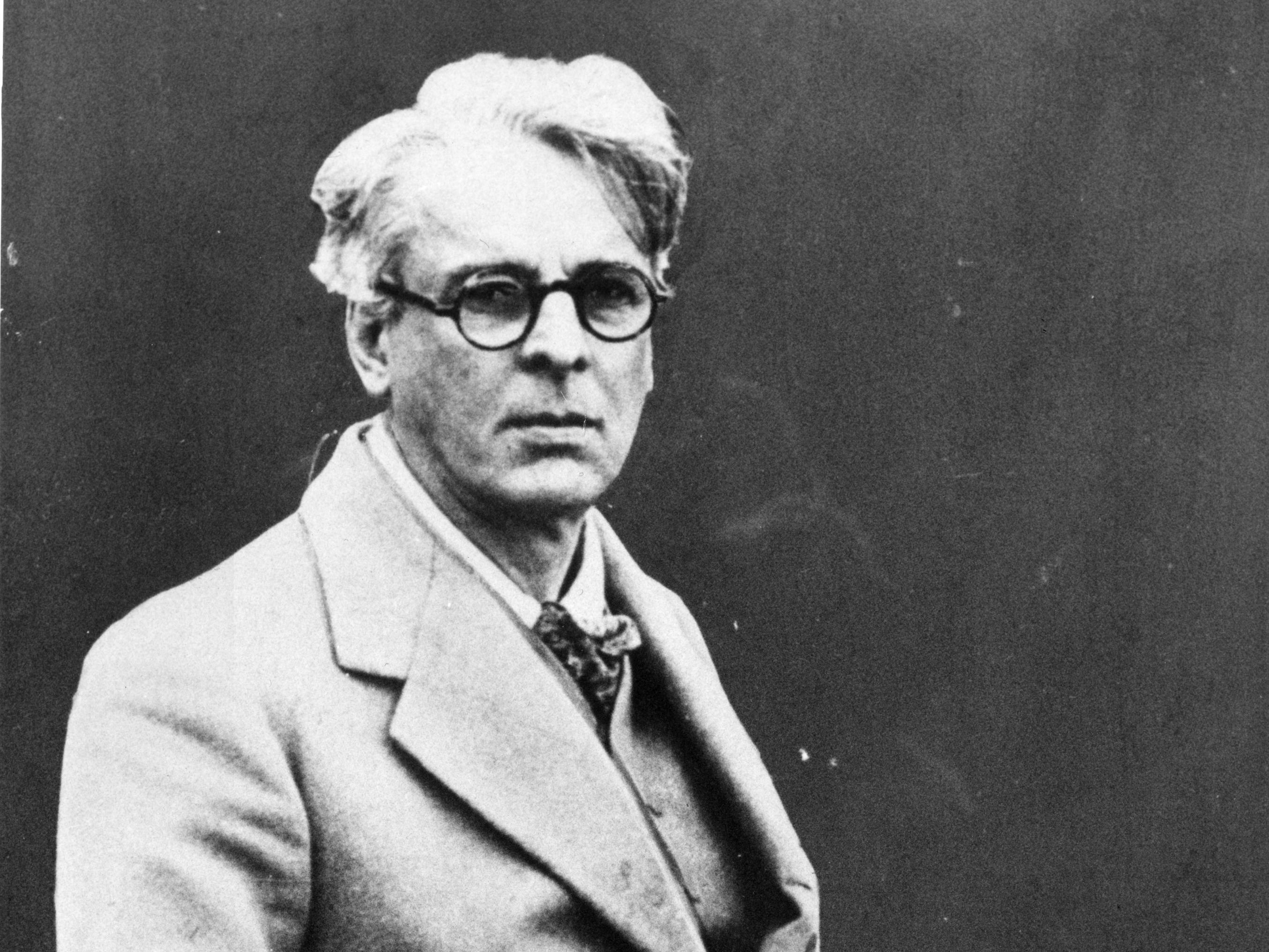 caption: Irish poet William Butler Yeats circa 1920.