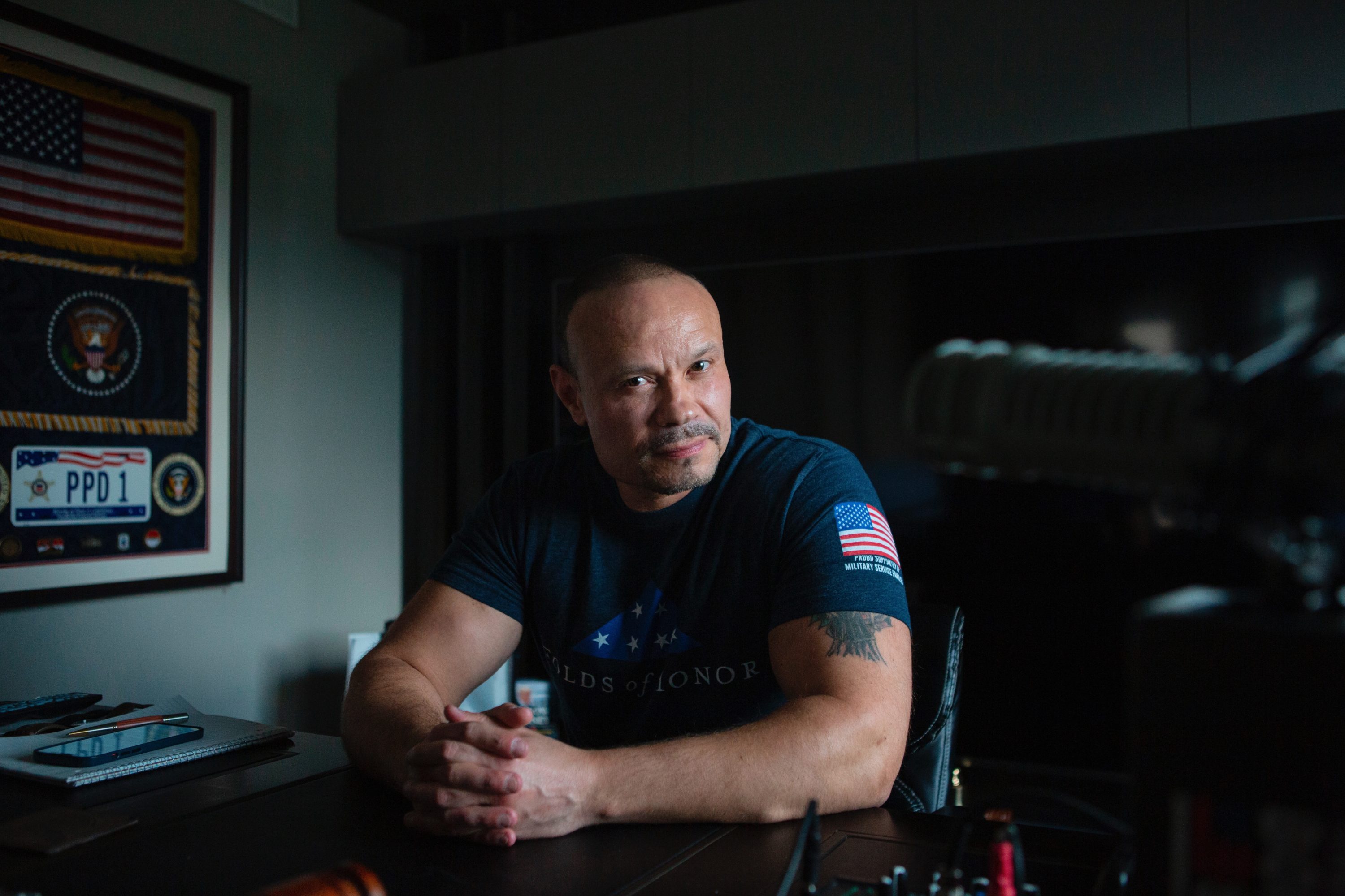 caption: Dan Bongino, a conservative commentator, is photographed in Stuart, Florida on Thursday, March 18, 2021. (Photo by Calla Kessler for The Washington Post via Getty Images)