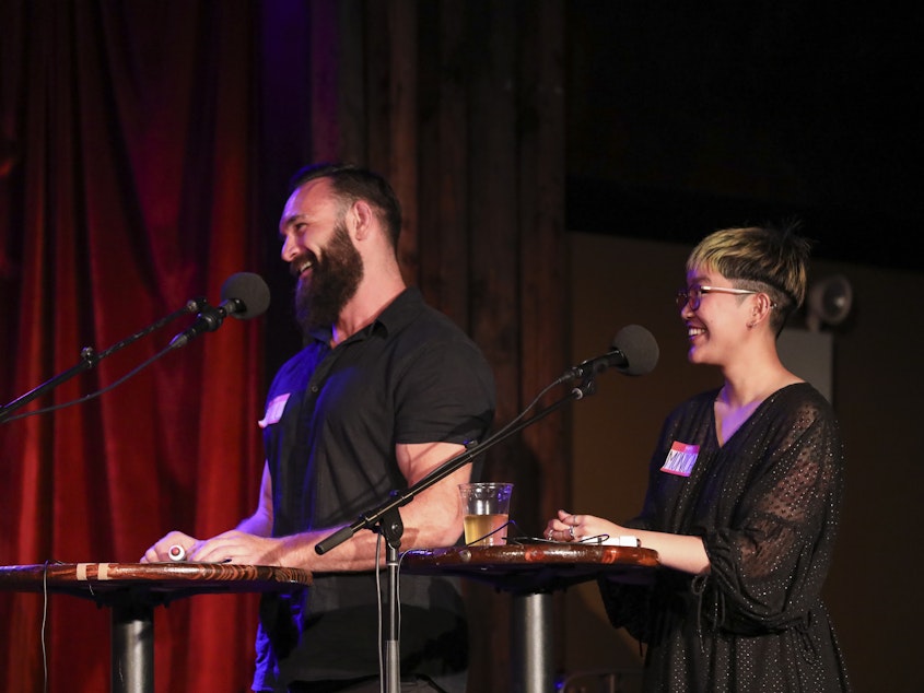 caption: Contestants Till Manthey and Monica Thieu appear on <em>Ask Me Another</em> at the Bell House in Brooklyn, New York.