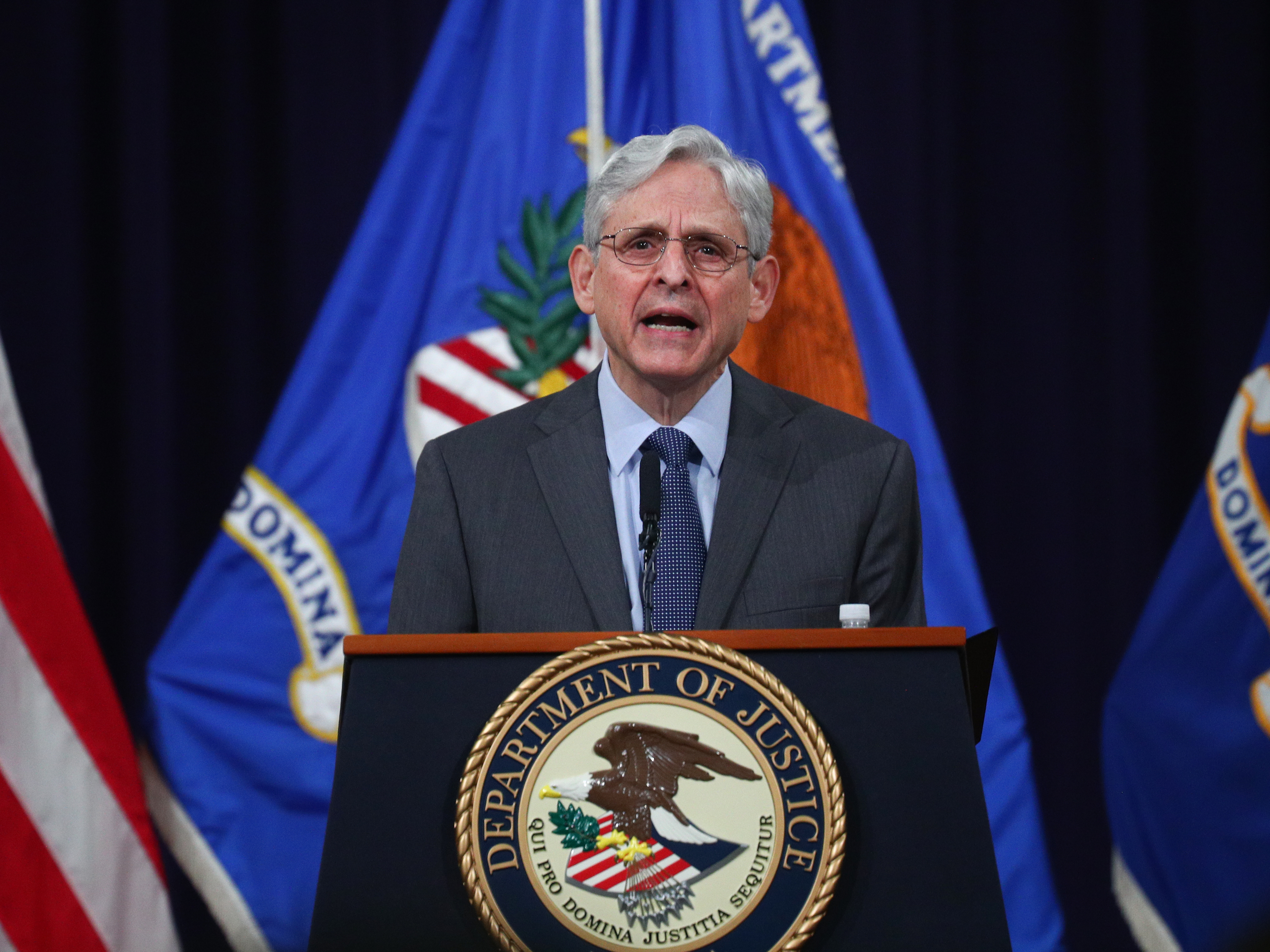 caption: U.S. Attorney General Merrick Garland delivers remarks on voting rights at the Department of Justice on Friday.
