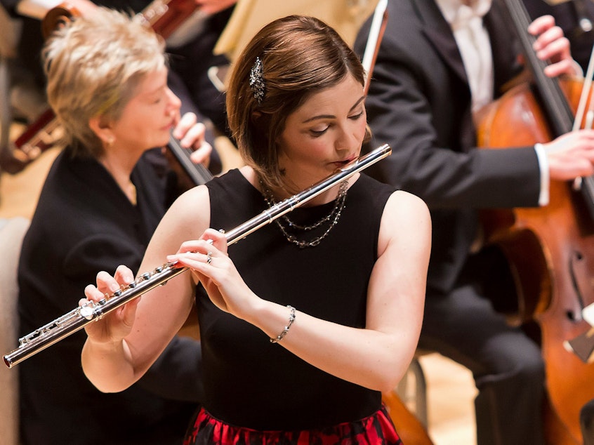 caption: Flutist Elizabeth Rowe, performing as a soloist with the Boston Symphony Orchestra in 2016.