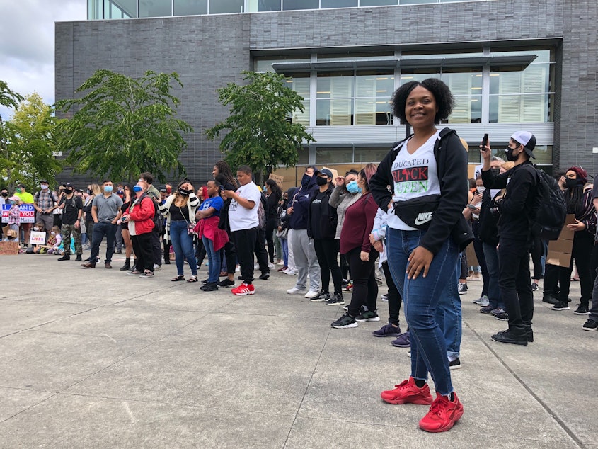 caption: Charleisha Cox in Burien on June 6, 2020, at protests over police brutality and systemic racism, sparked by the death of George Floyd