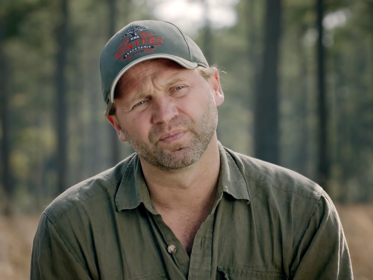 caption: Joshua Powell appears in "Trust the Hunter in Your Blood," an NRA fundraising film on YouTube.
