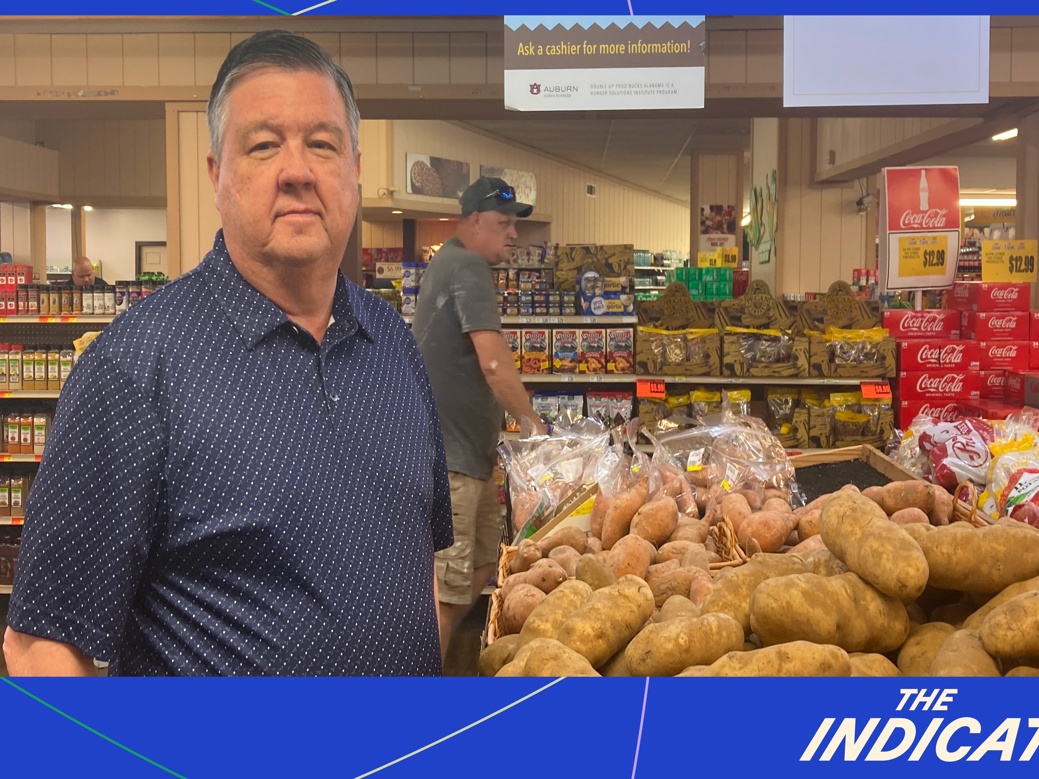 caption: Wright's Market owner Jimmy Wright stands inside his story in Opelika, Alabama on July 17, 2025. Wright worries cuts to SNAP will cause smaller grocers to shut down.