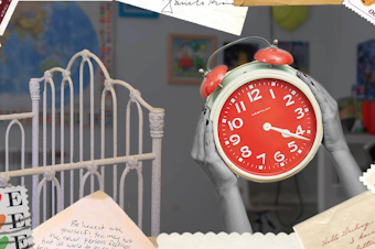A collage of a clock and a crib surrounded by stamps and stationary elements.
