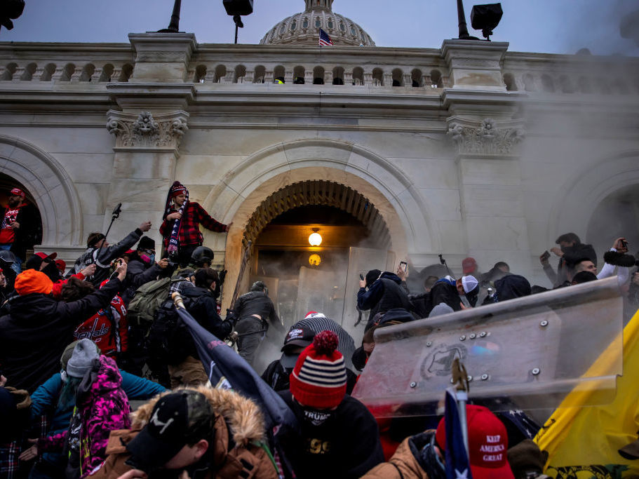 caption: Trump supporters clash with police and security forces as people try to storm the U.S. Capitol on Jan. 6.