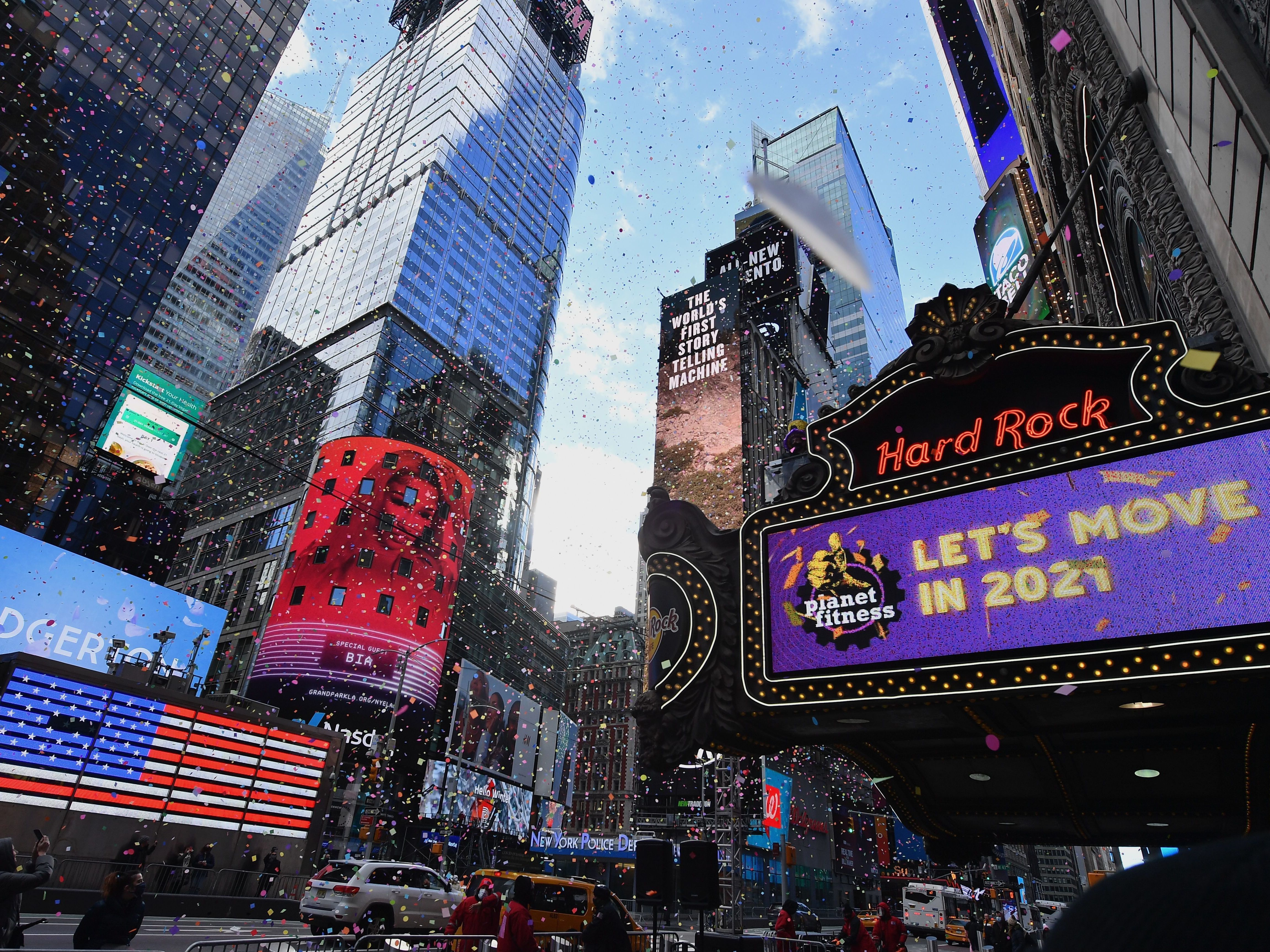 caption: New York City's Times Square on Thursday. The city's traditional New Year's Eve event will not be open to the public this year as the coronavirus continues to spread.