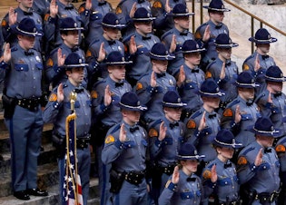 caption: Thirty-one new Washington State Troopers take the oath and are sworn in, joining the force with graduation ceremonies in the Capitol building in Olympia, WA.  The ceremony was in the Capitol Rotunda.&#13;&#13;Thursday Dec 13, 2018 208741