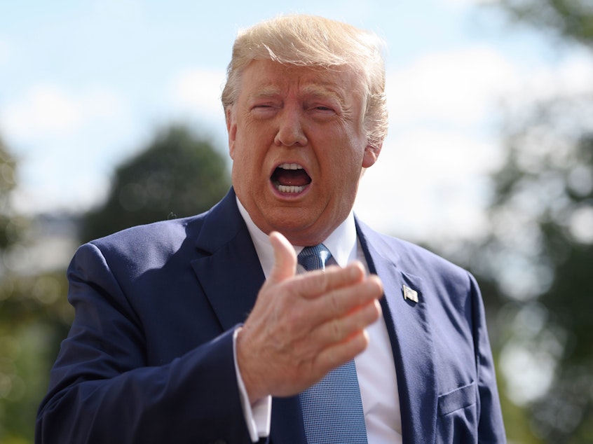caption: President Trump speaks to reporters outside the White House on October 4. The White House sent a letter to House Democrats saying they would not cooperate with requests as part of their impeachment inquiry.