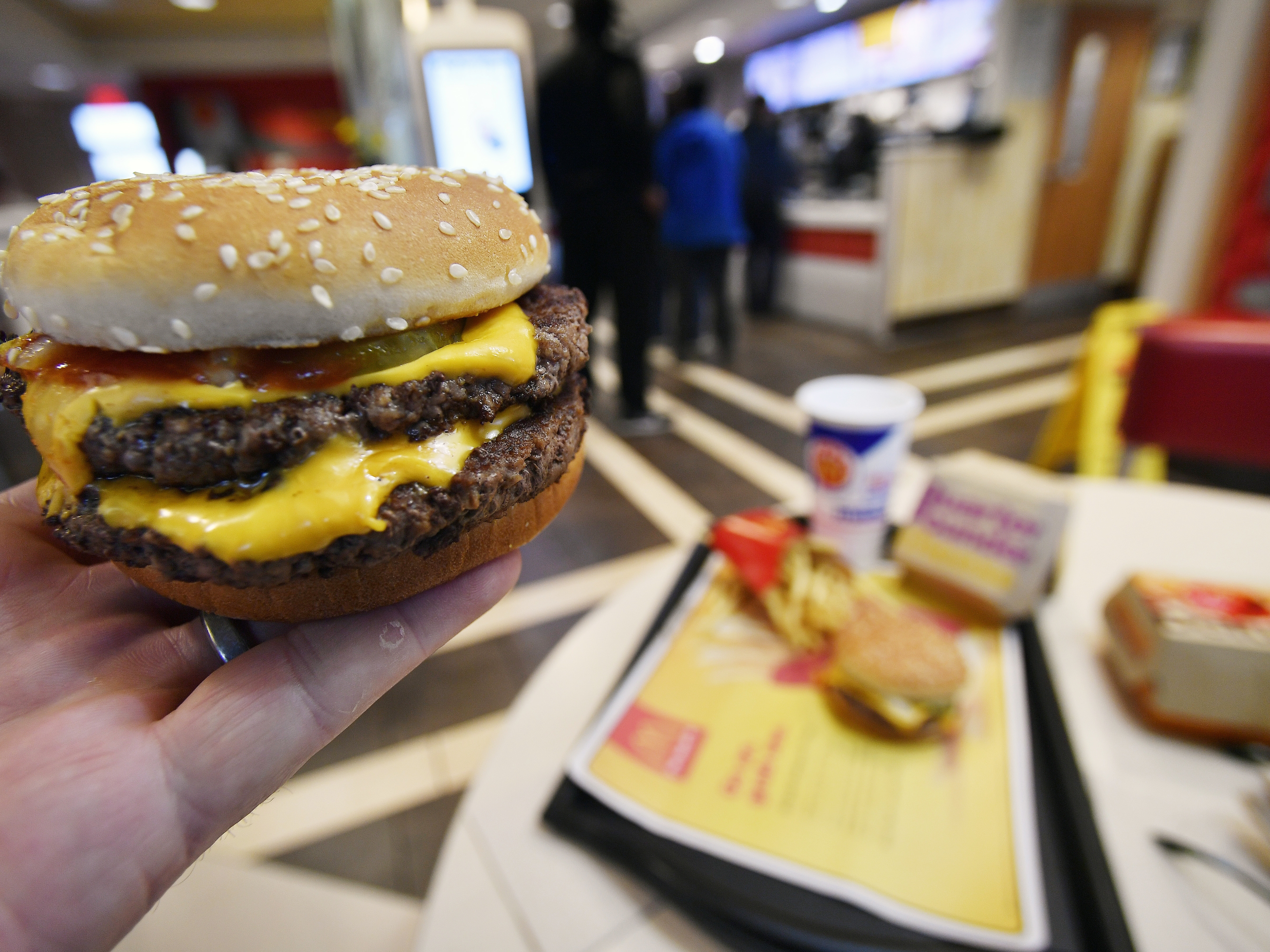 caption: A McDonald's Double Quarter Pounder is shown on March 6, 2018, in Atlanta.