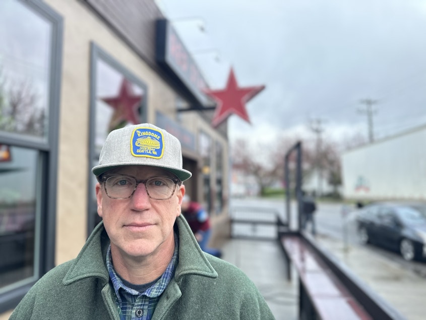 caption: Pete Hanning outside the Red Star Taco Bar in Fremont, which has struggled with multiple thefts and vandalism. Hanning says he can help. 