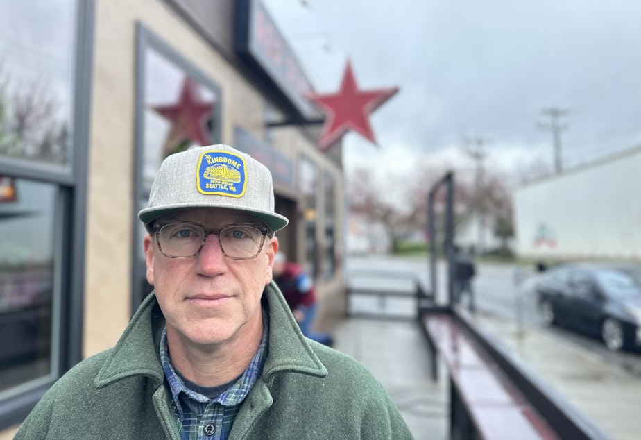caption: Pete Hanning outside the Red Star Taco Bar in Fremont, which has struggled with multiple thefts and vandalism. Hanning says he can help. 