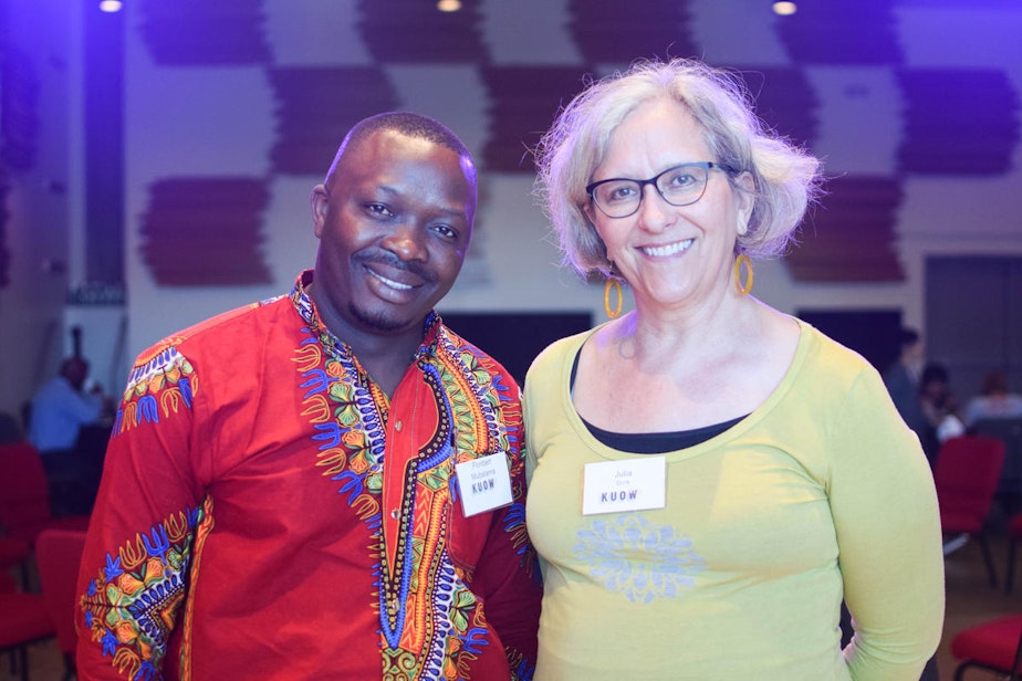 caption: Floribert and Julia at KUOW's Ask an Immigrant event