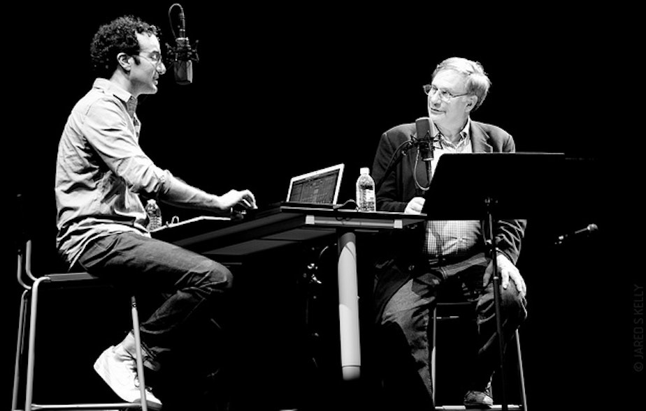 caption: Jad Abumrad and Robert Krulwich on stage in 2011 at the 5th Avenue Theatre in Seattle.