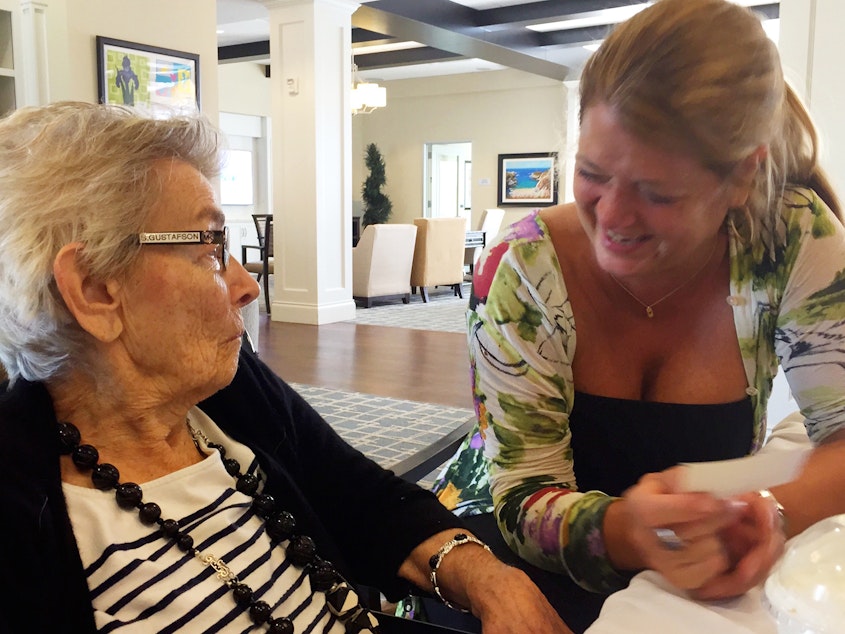 caption: Nancy Gustafson (right), an opera singer, used singing to reconnect with her mother, Susan Gustafson, who had dementia and was barely talking. She says her mom started joking and laughing with her again after they sang together.