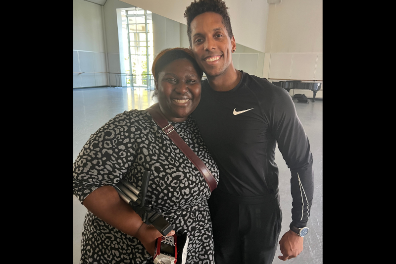 caption: KUOW Reporter Diana Opong with Johnathan Batista. Batista made history in 2022 when he became the first Black principal dancer at the Pacific Northwest Ballet. 