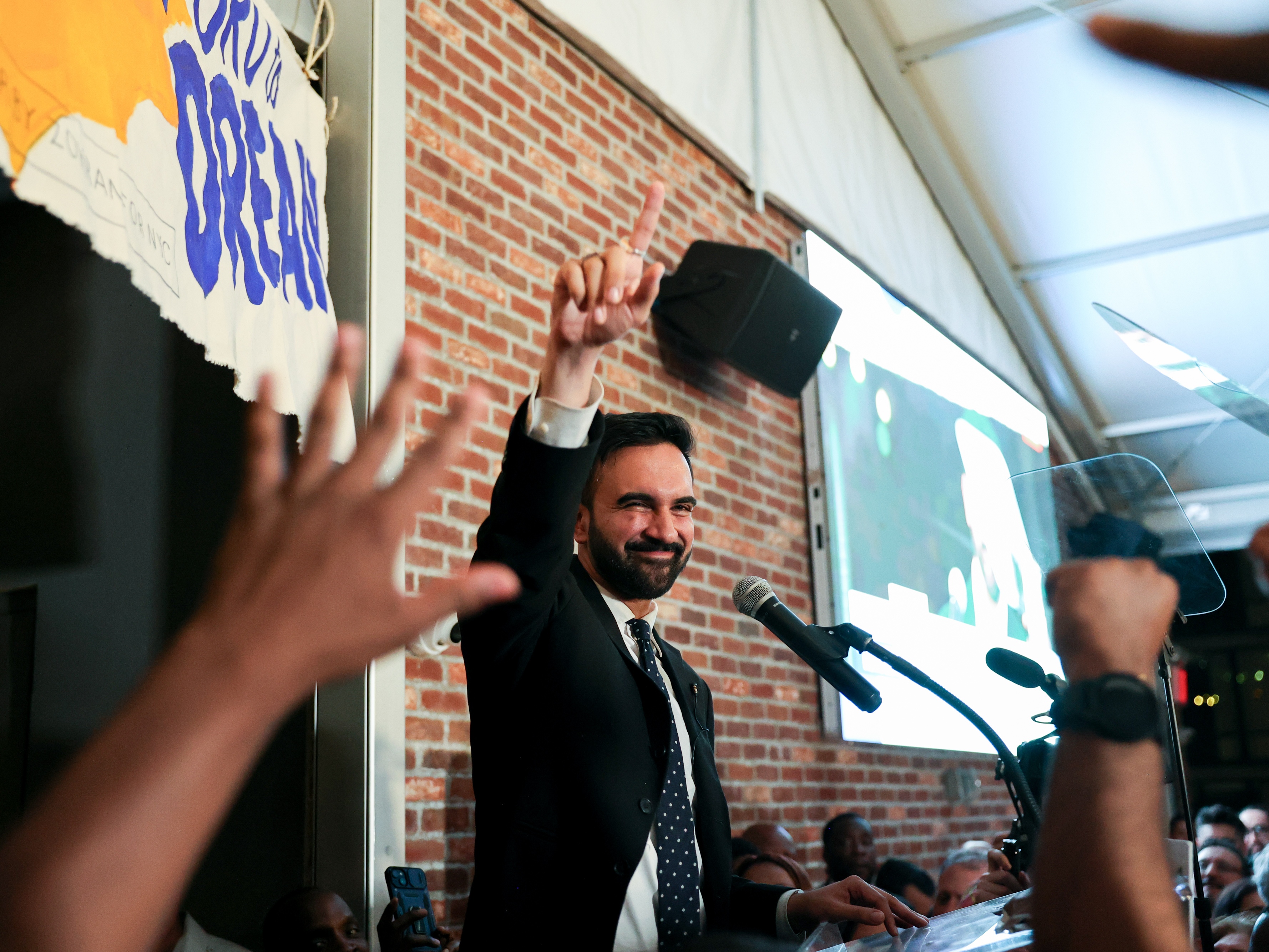 caption: Zohran Mamdani, New York City mayoral candidate, celebrates at an election night event in New York early Wednesday morning as he takes an early lead.