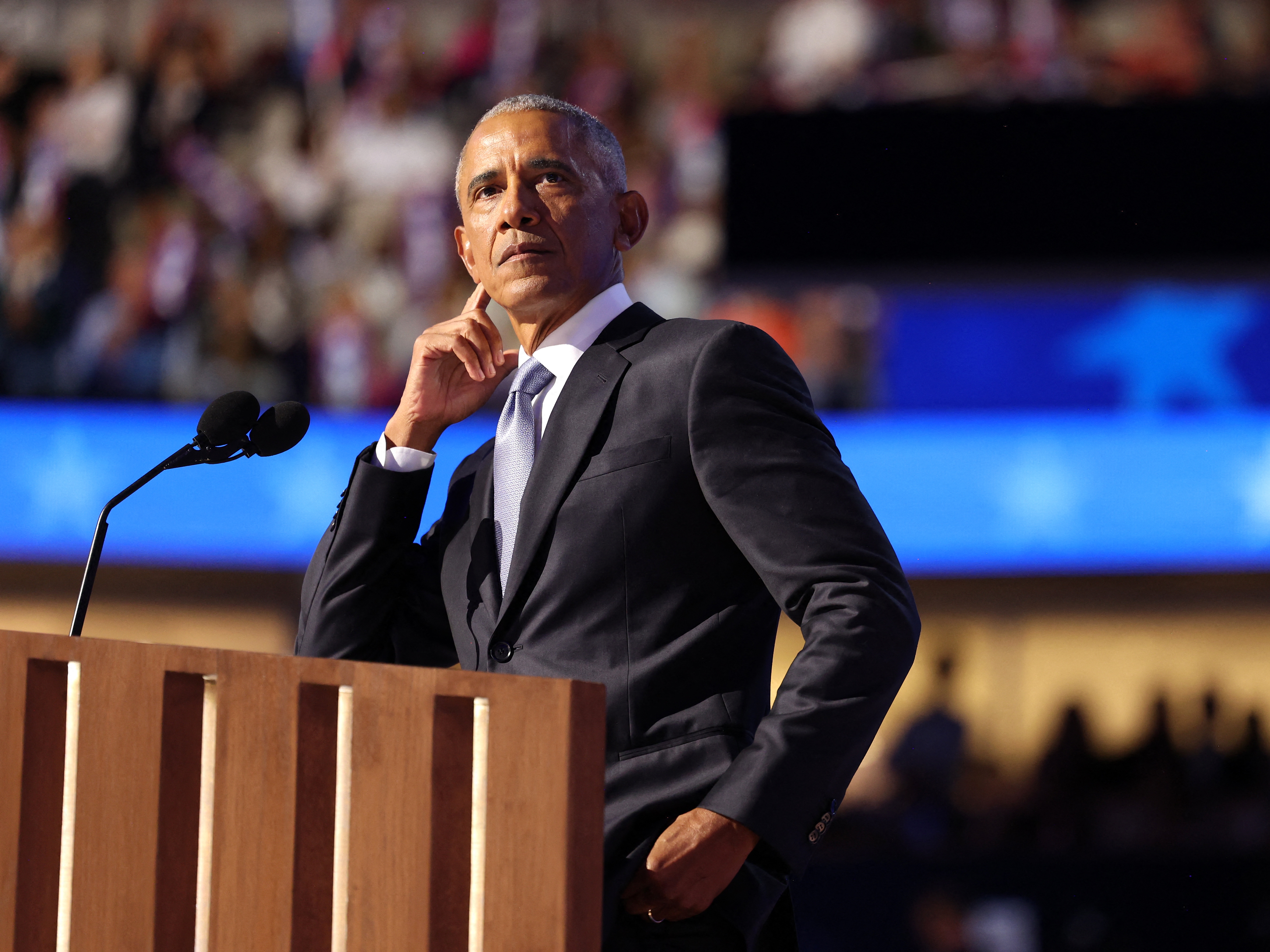 caption: Former US President Barack Obama gestures as he speaks on the second day of the Democratic National Convention in Chicago, Illinois, on August 20, 2024.