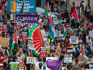caption: Tens of thousands of pro-Palestinian activists take part in a National March to call for a permanent ceasefire in Gaza on December 9, 2023, in London, United Kingdom.