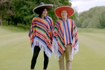 caption: <em>The Great British Bake Off</em> hosts Noel Fielding and Matt Lucas opening the "Mexican Week" episode while wearing sombreros and sarapes.