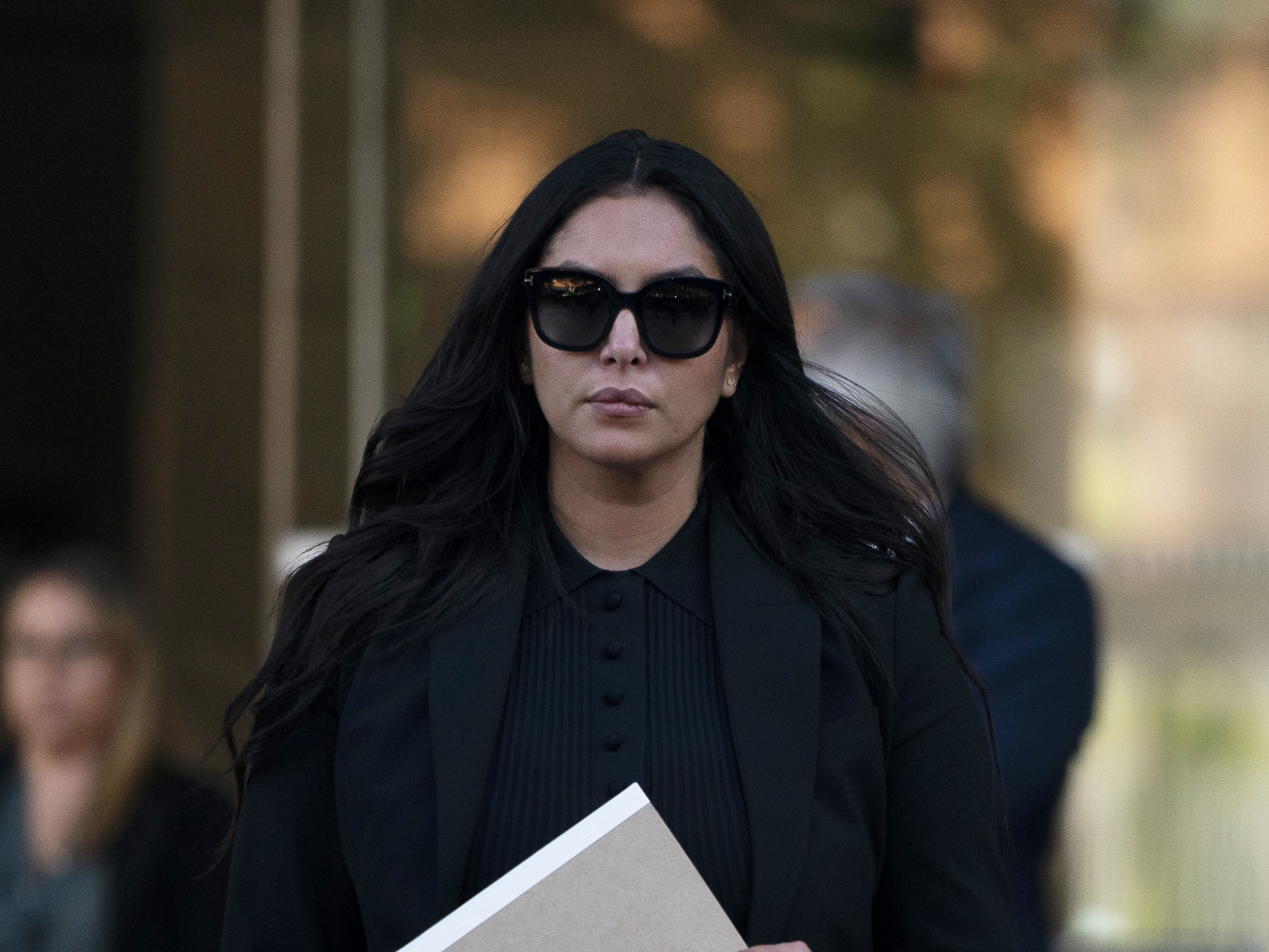 caption: Vanessa Bryant, the widow of Kobe Bryant, leaves a federal courthouse in Los Angeles on Aug. 10.