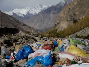 caption: Trash from an informal dump in far northern Pakistan is frequently incinerated, sending up plumes of foul-smelling smoke right near a glacial lake frequented by tourists.