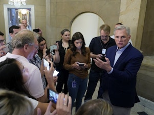 caption: Speaker of the House Kevin McCarthy, R-Calif., speaks with members of the press from Capitol Hill on Sunday after participating in a phone call on the debt ceiling with President Joe Biden.
