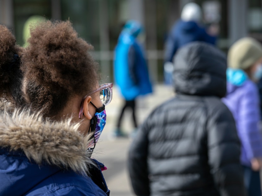 caption: A pediatrician in Kentucky says she's seeing an increase of children with COVID-19. Cases are spiking for people all ages across the country. Research suggests that in-person schooling is not a significant reason.