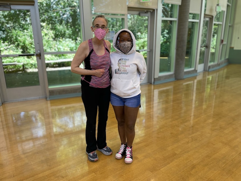 caption: Cindy House (right) with Donna Shaeffer (left) at the Meadowbrook Community Center in Seattle.