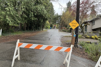 caption: Residents of 20 homes on Mercer Island near 95th Court Southeast were evacuated Wednesday April 3, 2024, due to risks of landslides or flooding. 