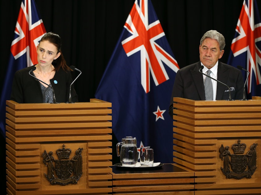 caption: Prime Minister Jacinda Ardern and Deputy Prime Minister Winston Peters speak to media during a press conference at Parliament on Monday.