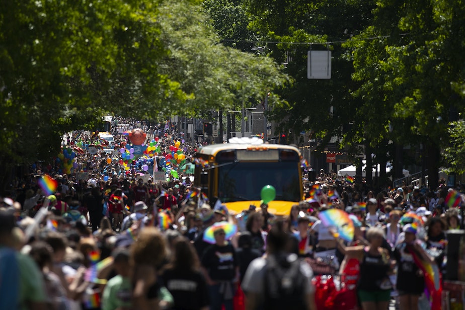 caption: Thousands gathered for Seattle’s Pride Parade on Sunday, June 25, 2023, beginning at Westlake Park in downtown Seattle. 