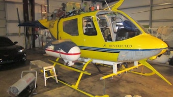 caption: The yellow helicopter belonging to Steve Owen of Pacific Air Research was at the center of an investigation into alleged overspray during an aerial herbicide application onto forestland in Curry County.