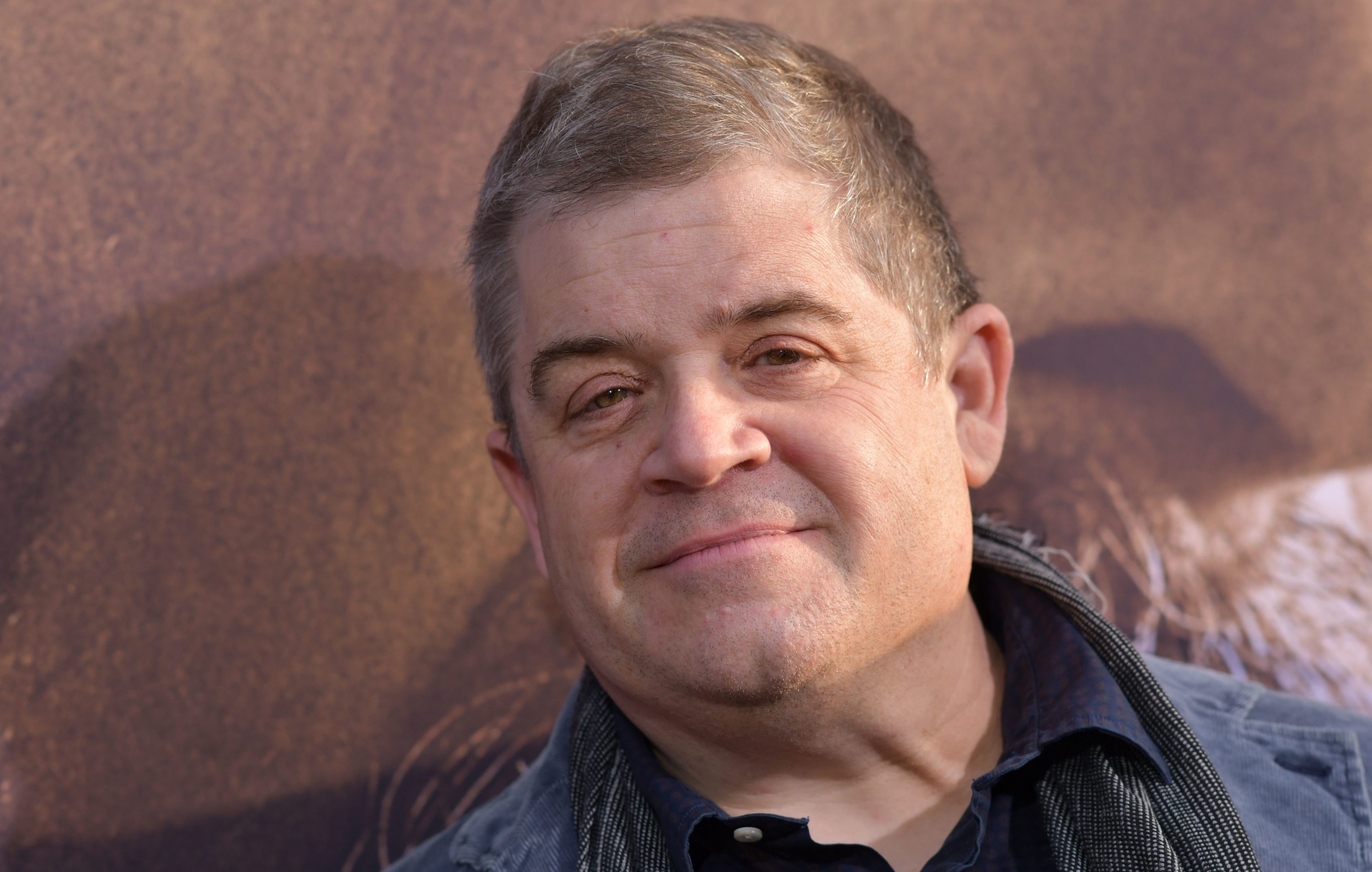 caption: Actor Patton Oswalt. (Chris Delmas/AFP via Getty Images)