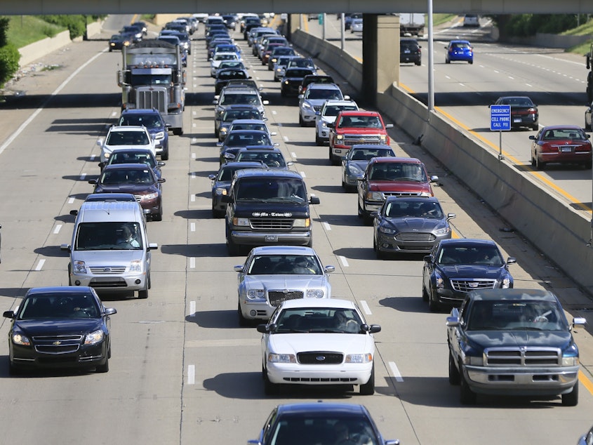 caption: Every car in Michigan that was covered by insurance as of the end of October will bring its owner $400, under a new refund plan approved by Gov.  Gretchen Whitmer's administration.