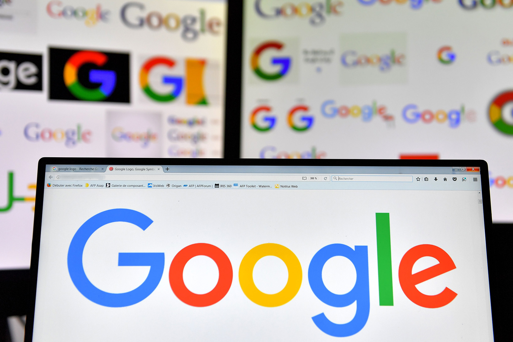 caption: A picture taken on Nov. 20, 2017 shows logos of U.S. multinational technology company Google. (Loic Venance/AFP via Getty Images)