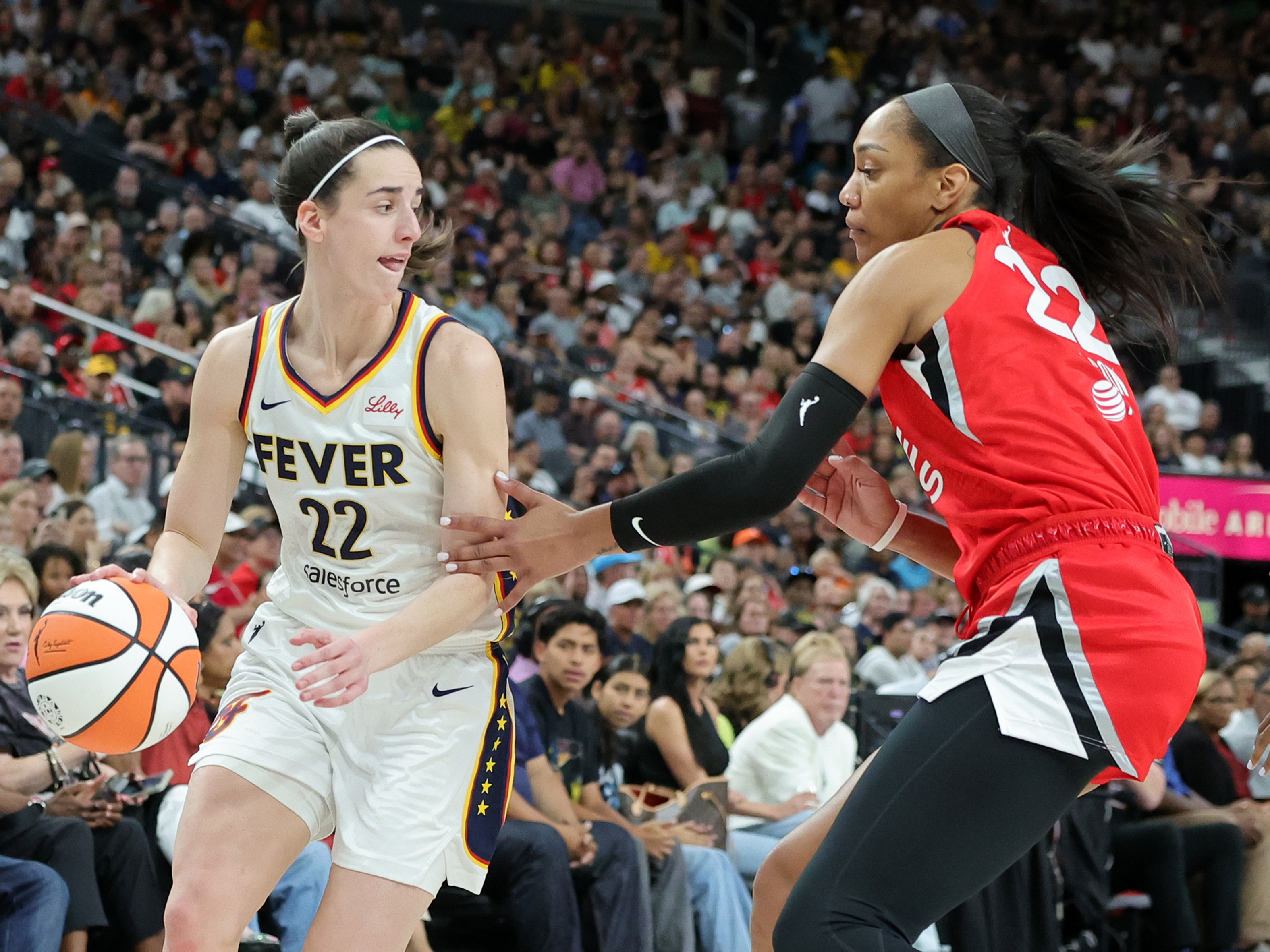 caption: Caitlin Clark of the Indiana Fever and A'ja Wilson of the Las Vegas Aces are considered to be two of this year's leading MVP candidates.