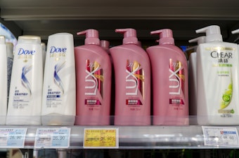 caption: Unilever products on display at a grocery in Beijing.
