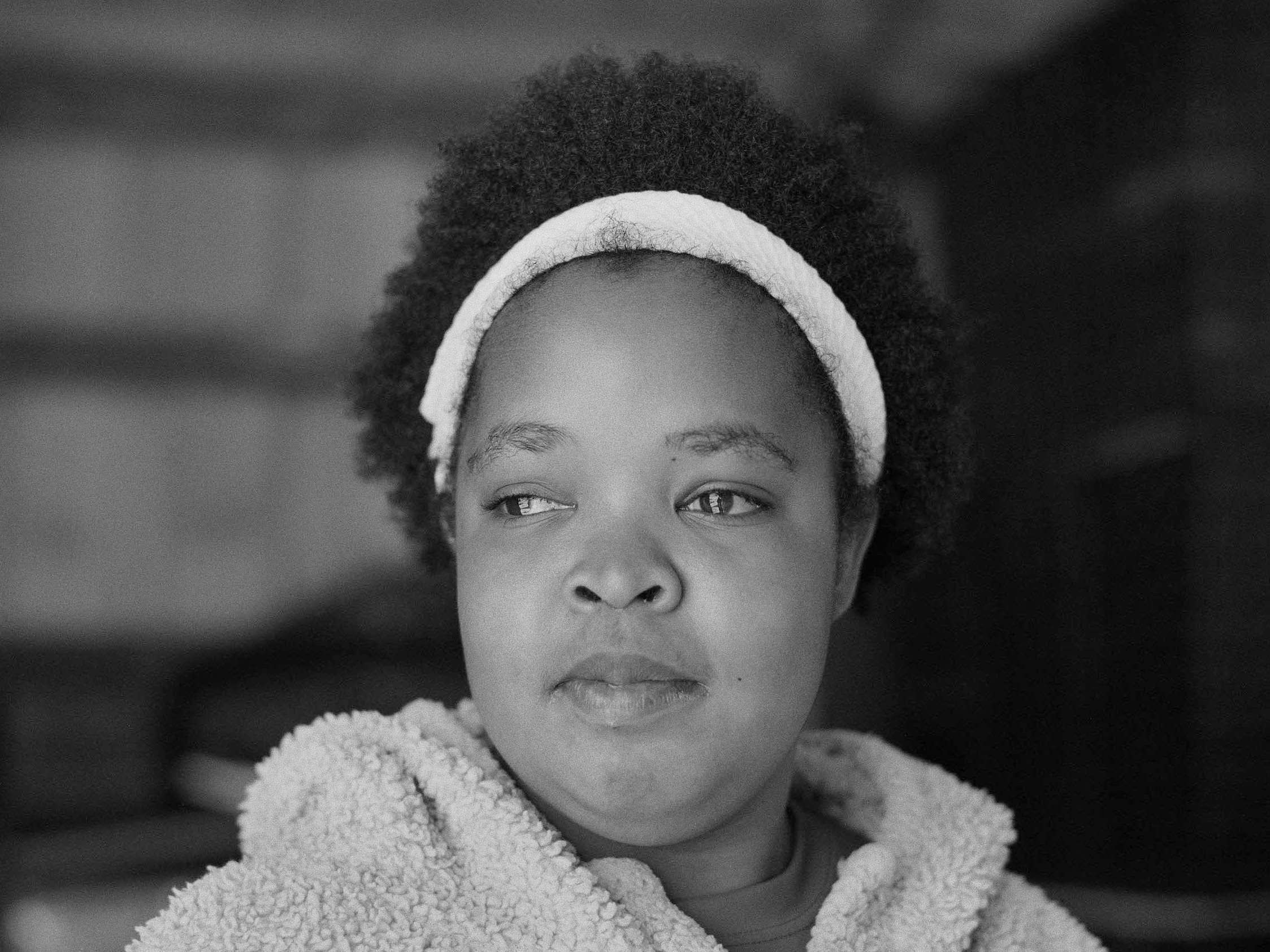 caption: Serena Ashun is a team member at Hugs Greenhouse in McKinney, Texas.