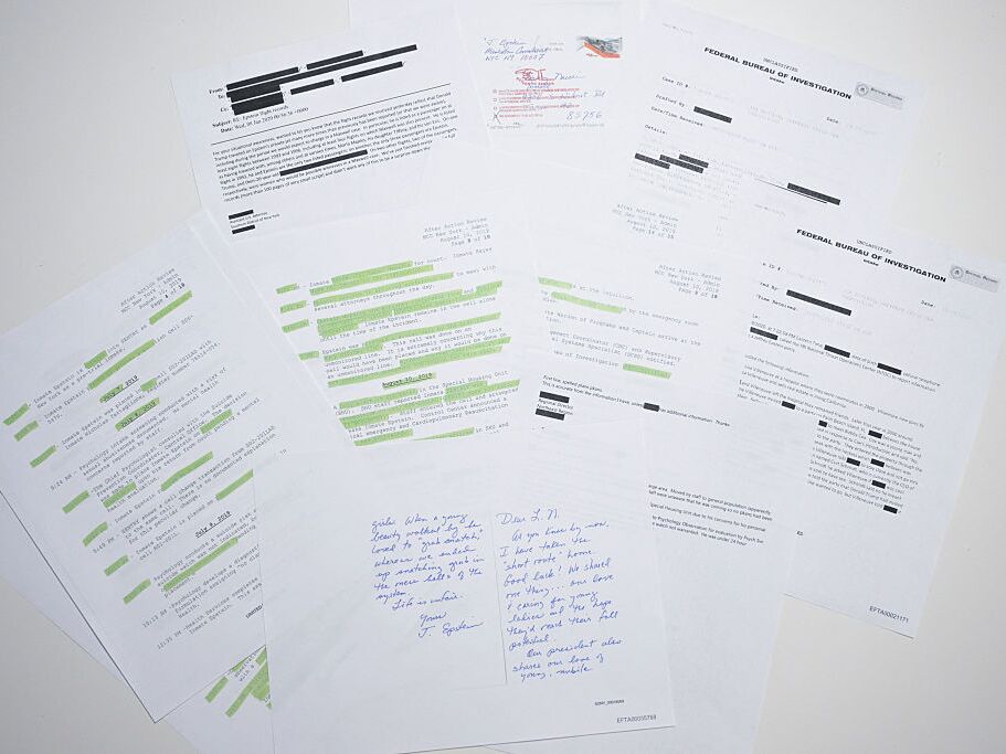 caption: This photo illustration shows a new batch of files released in December by the U.S. government in relation to the late sex offender Jeffrey Epstein.