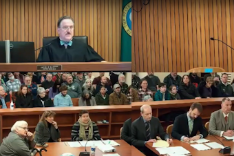 caption: Judge Jeffrey Bassett declines to hear a challenge to placing Donald Trump on the 2024 ballot on Jan. 16, 2024,  saying that plaintiffs will have to pursue the effort in Thurston County, where the state Capitol is located. Also present were Frankey Ithaka, who represents eight voters to filed the challenge, as well as representatives from the Secretary of State's Office, the Washington State Republican Party, and the Kitsap County Auditor. 