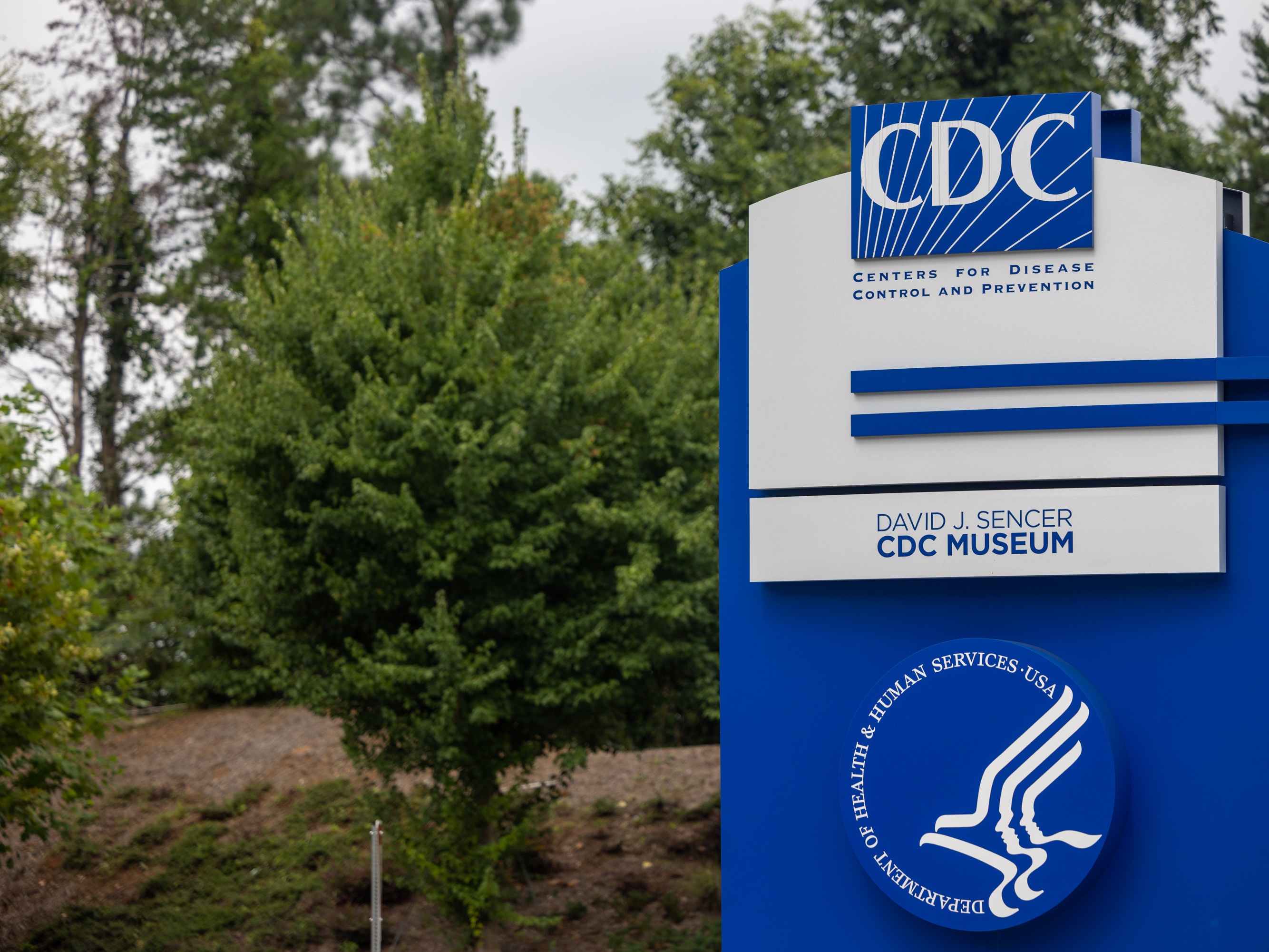 caption: The sign at Centers for Disease Control and Prevention headquarters in Atlanta, Georgia. The CDC is tasked with protecting the public's health.