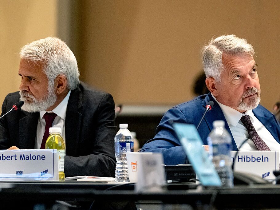 caption: New committee members Dr. Robert Malone, left, and Dr. Joseph Hibbeln during the first meeting of the CDC's Advisory Committee On Immunization Practices at the Centers for Disease Control and Prevention in Atlanta, Ga.