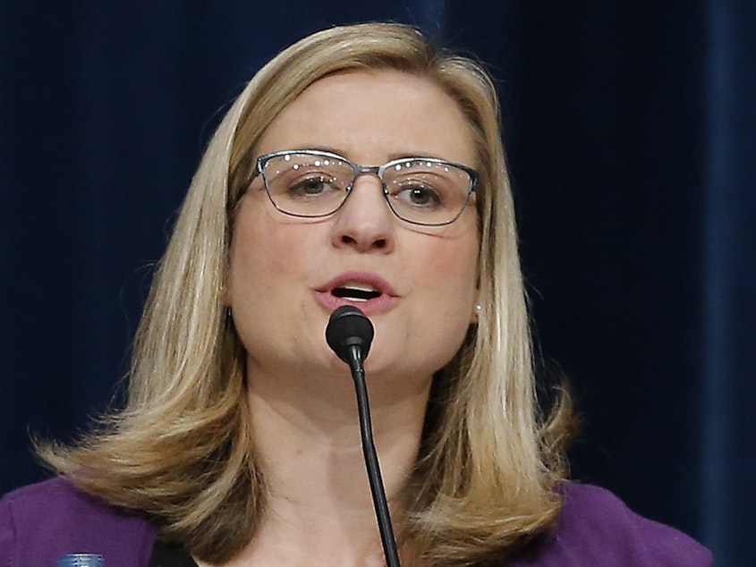 caption: On Saturday, Phoenix Mayor Kate Gallego, pictured above in September 2018, apologized to the city following an outcry over footage showing police officers pointing a gun and yelling at a family as part of an investigation into a claim that a doll was shoplifted from a Family Dollar store in Phoenix.
