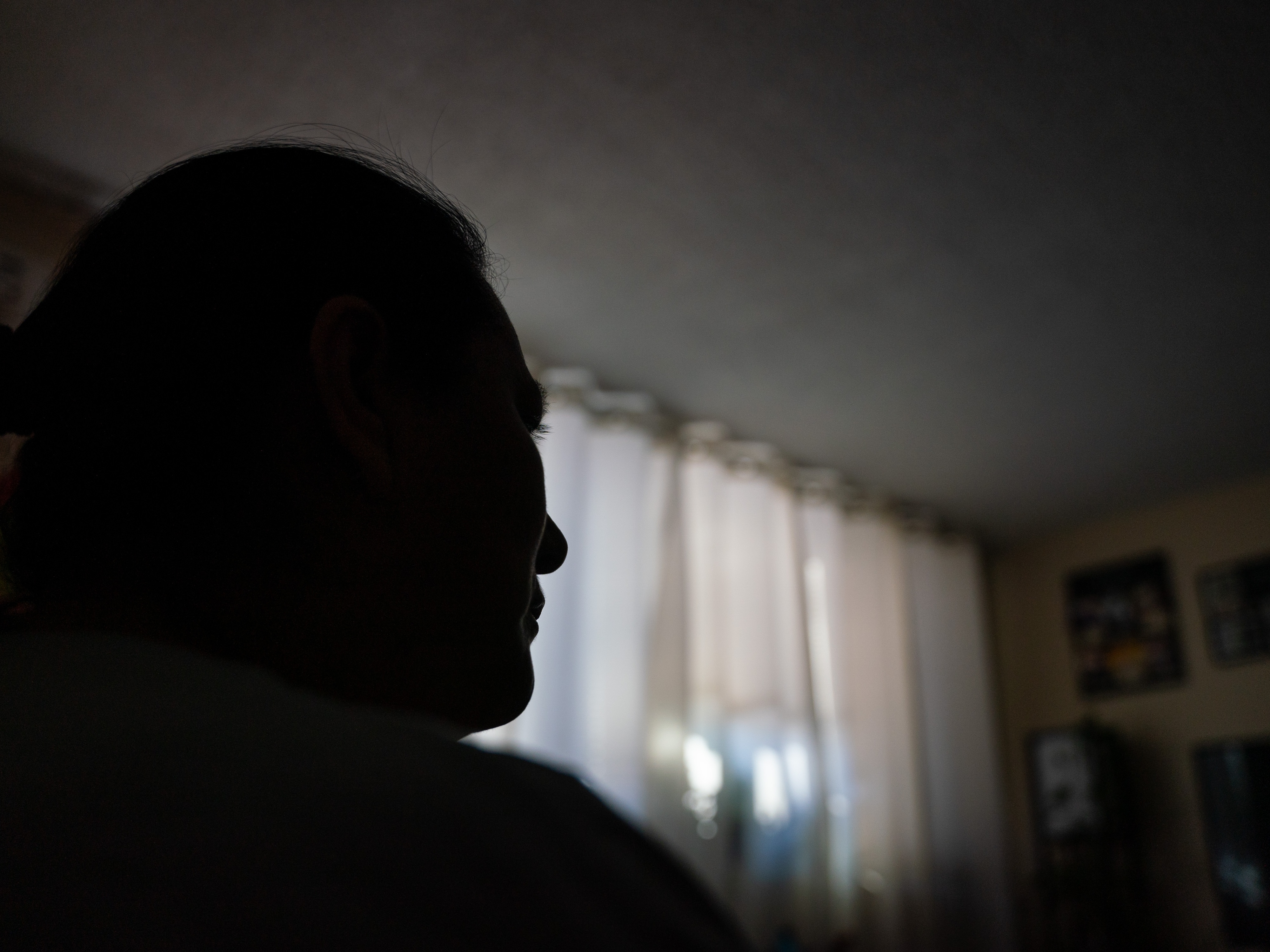 caption: A, a mother of two young daughters who are U.S. citizens, hasn't left her Minneapolis apartment in over a month, for fear she'll be detained by ICE officers. She says her 2-year-old is crying more and having more tantrums because of all the time indoors.