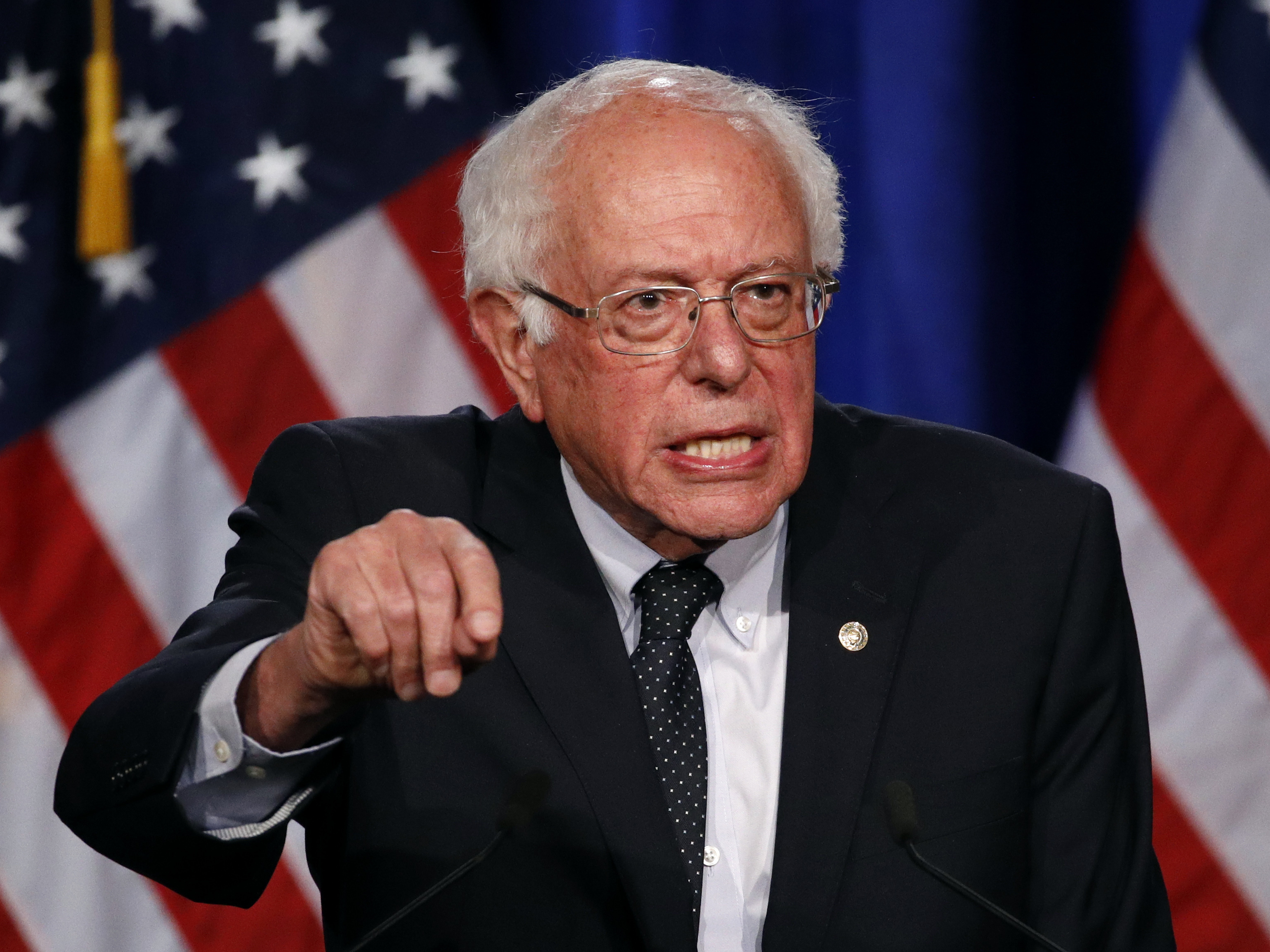 caption: Democratic presidential candidate Sen. Bernie Sanders of Vermont speaks about his "Medicare for All" proposal on Wednesday at George Washington University.