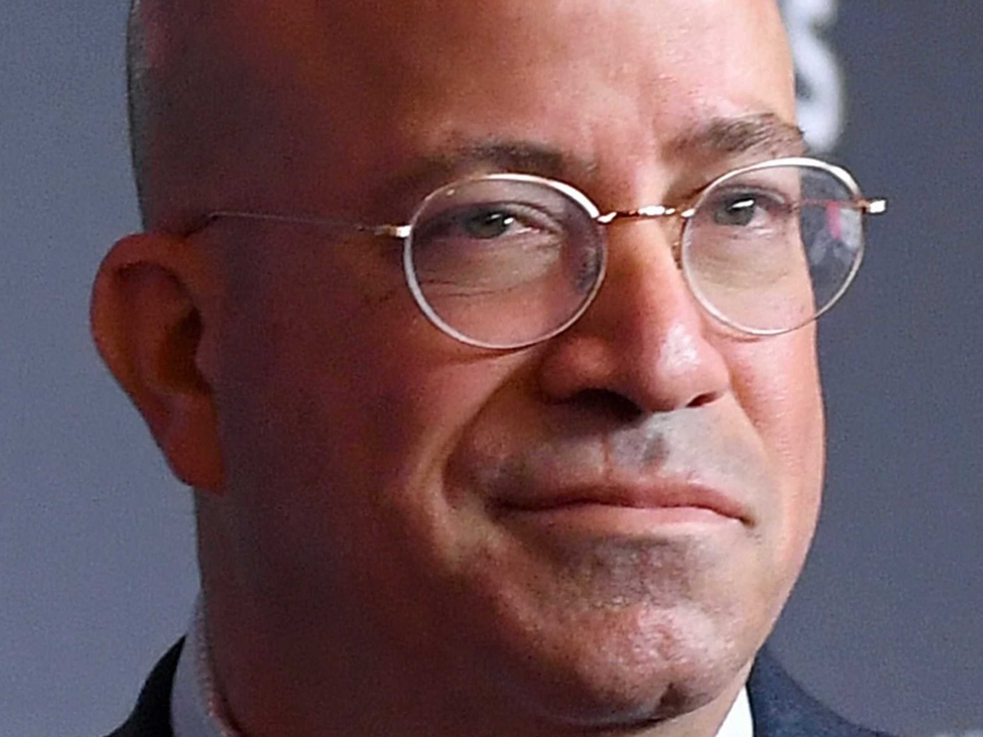 caption: CNN's Erin Burnett and Alisyn Camerota (at left and right) are among the stars who have raised sharp questions about the ouster of former network chief Jeff Zucker (center).