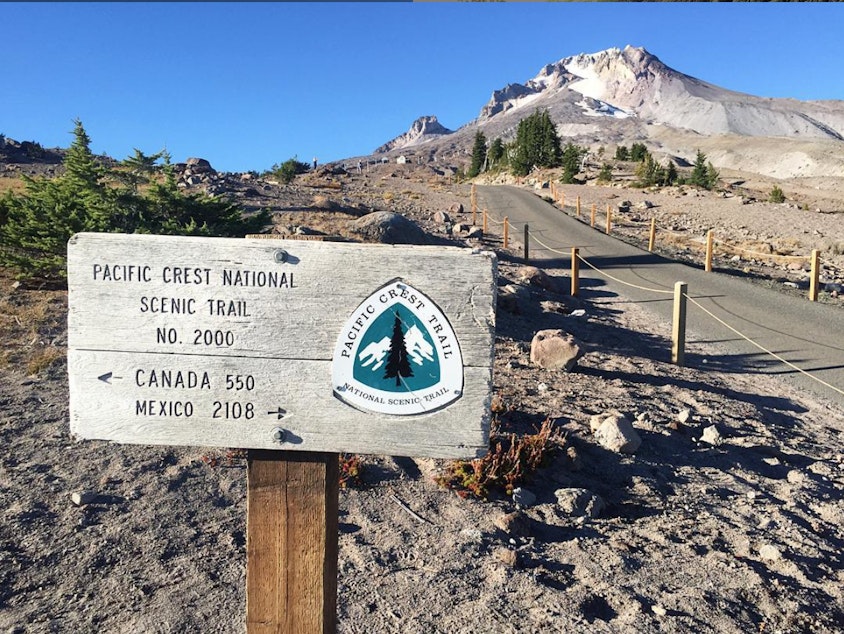 caption: A sign for the Pacific Crest Trail is shown on September 9, 2015, near Timberline Lodge on Mt. Hood.  